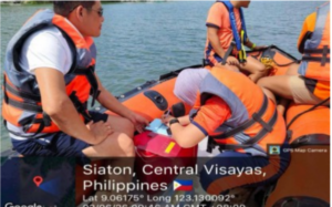 A team from the Philippine Coast Guard and the Metro Dumaguete Water collect water samples from Tambobo Bay in Siaton, Negros Oriental